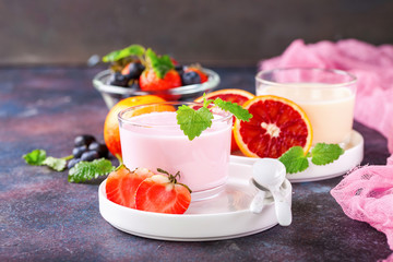 Strawberry yogurt  on a table. Selective focus. Copy space