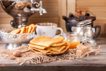 Fototapeta premium Pancakes with honey. Selective focus