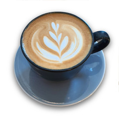 Top view of a mug of latte art coffee isolted on white background.