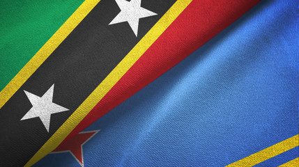 Saint Kitts and Nevis and Aruba two flags textile cloth, fabric texture