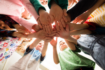 Group of Children's hands together in a circle