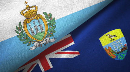 San Marino and Saint Helena two flags textile cloth, fabric texture