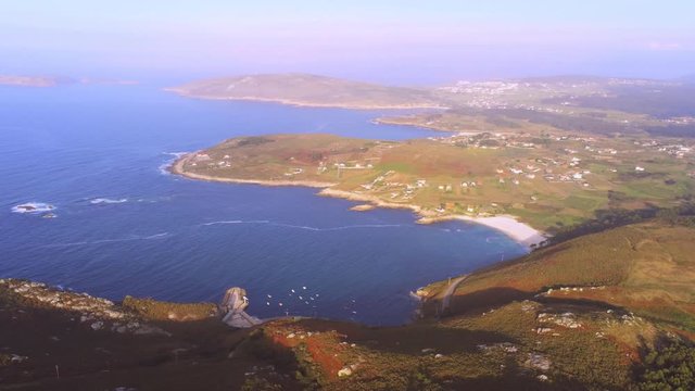 Beautiful seascape of Barizo Beach in sunny day. Aerial pan left. Galicia,Spain