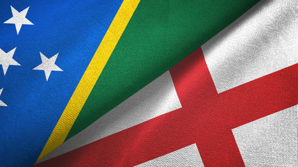 Solomon Islands and England two flags textile cloth, fabric texture