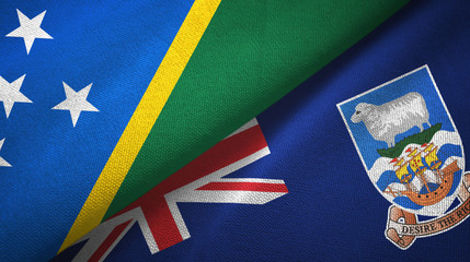 Solomon Islands and Falkland Islands two flags textile cloth, fabric texture