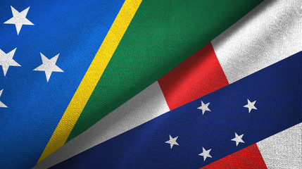 Solomon Islands and Netherlands Antilles two flags textile cloth, fabric texture