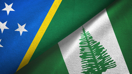 Solomon Islands and Norfolk Island two flags textile cloth, fabric texture