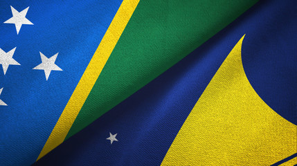 Solomon Islands and Tokelau two flags textile cloth, fabric texture