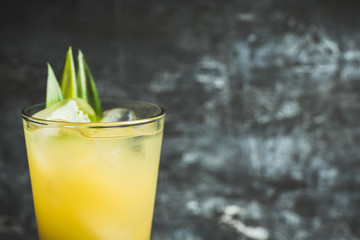 Pineapple cocktail in highball glass. Selective focus. Shallow depth of field.
