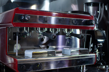Coffee machine inside the car. Professional car preparation for the coffee trade. Store on wheels. Coffee grinder and milk fryer. The new coffee machine is conveniently integrated into vehicles.