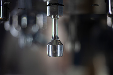 Coffee machine inside the car. Professional car preparation for the coffee trade. Store on wheels. Coffee grinder and milk fryer. The new coffee machine is conveniently integrated into vehicles.