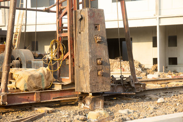 Fototapeta premium Construction site, pile driving machine is working