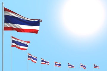 beautiful feast flag 3d illustration. - many Thailand flags placed diagonal on blue sky with space for your text