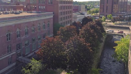 Aerial: The city of Bangor & the Kenduskeag Stream, Maine, USA.  2 September 2019