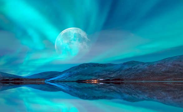 Northern lights (Aurora borealis) in the sky with super full moon - Tromso, Norway "Elements of this image furnished by NASA"