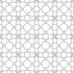 Geometric print in arabic style. Gray pattern on white seamless background