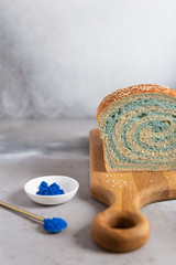 Blue matcha bread with milk and honey. Blue spirulina, superfoods. Copy space