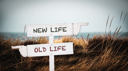 Street Sign to NEW LIFE versus OLD LIFE - obrazy, fototapety, plakaty