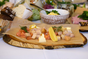 Cold Appetizers with a variety of food on the table. Gorging on calories at a holiday reception.