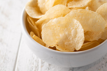 Potato chips heaping in a bowl
