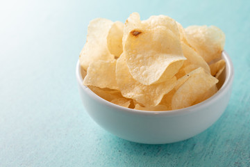 Potato chips heaping in a bowl