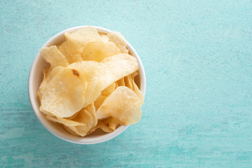 Potato chips heaping in a bowl