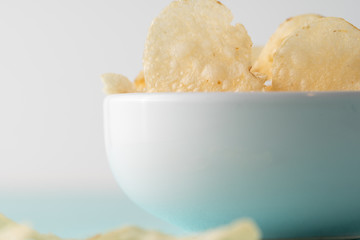 Potato chips heaping in a bowl