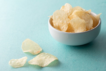 Potato chips heaping in a bowl