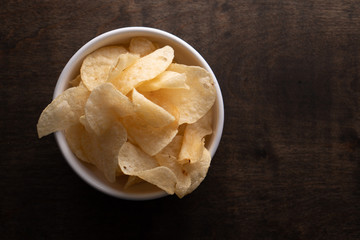 Potato chips heaping in a bowl