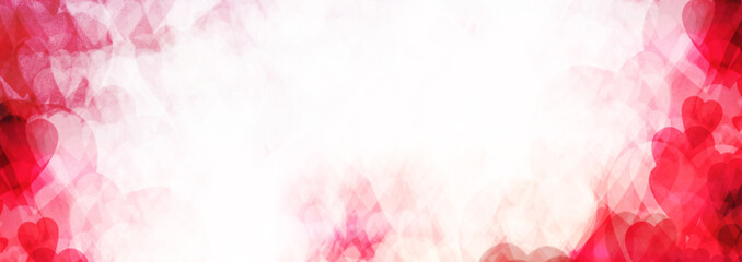 Abstract background. Pink hearts dissolve in a white background. valentines day and love. Computer textured background. Long banner format. Red hearts. Bright to light gradient