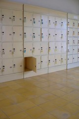 Wooden locker cabinets for storing personal belongings are safe because they are equipped with a lock on each locker.
