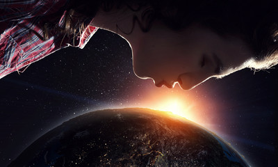 Fototapeta na wymiar Woman kiss globe . Mixed media