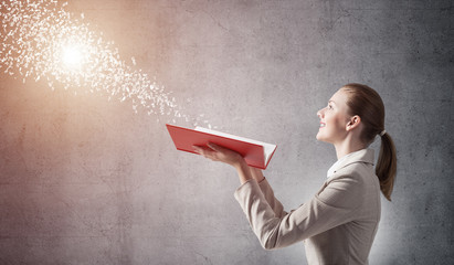 Woman looking at flying out random letters