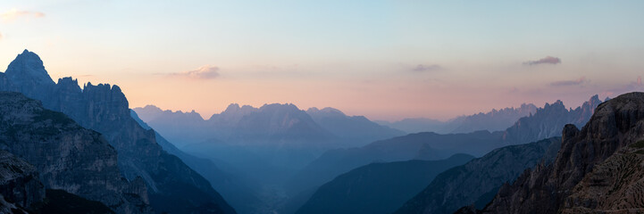 Looking South-East from the Three Peaks in the Dolomite Alps during sunrise, South Tyrol, Italy