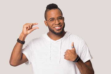 Smiling black man demonstrate small prices recommending service