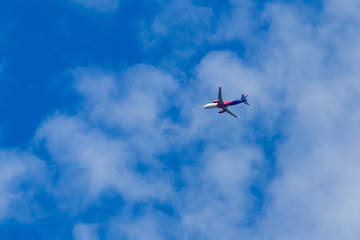 Airplane flying in the blue sky