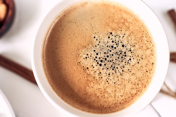 cup of fresh espresso on table, view from above