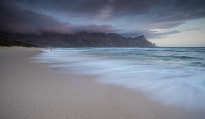 Wide angle landscape image of the stunning beach at Kogelbay in the Western Cape of South Africa