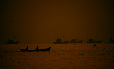 boats at sunset