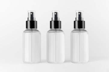 Three spray bottles for cosmetics product with transparent liquid on white background, mock up for branding, advertising, design.