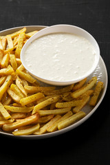 Homemade Crispy Ranch Fries, side view. Close-up.