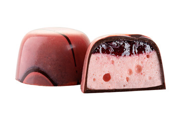Cut chocolate candy with jelly and marshmallow filling isolated on white background