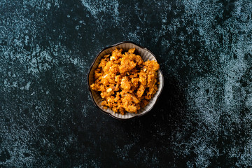 Gajar ka halwa / Halva is a carrot-based sweet dessert pudding from India. Garnished with Cashew/almond nuts and Served in a bowl.