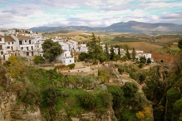 Fototapeta na wymiar Amazing city on the edge of the Ronda gorge, Andalusia, Spain.