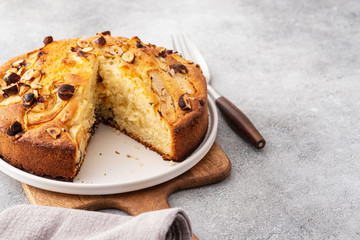 Homemade pie with nuts and apples. Copy space.