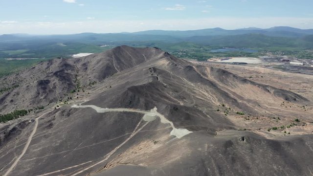 Aerial view of wasteland at Mount Karabash. Bald mountain with barren land. Pollution of natural environment by industrial production in Karabash town, Chelyabinsk Oblast, Ural, Russia
