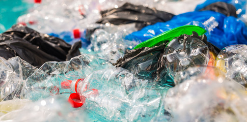 Problem of trash, plastic recycling, pollution and environmental concept - Plastic rubbish pollution in water environment.