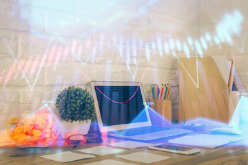 Financial market graph hologram and personal computer on background. Multi exposure. Concept of forex.