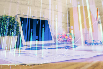 Financial market graph hologram and personal computer on background. Multi exposure. Concept of forex.