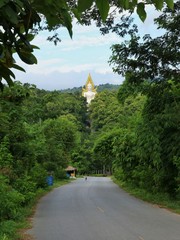 Fototapeta na wymiar The white buddha statue in Nakhonnayok province, Thailand